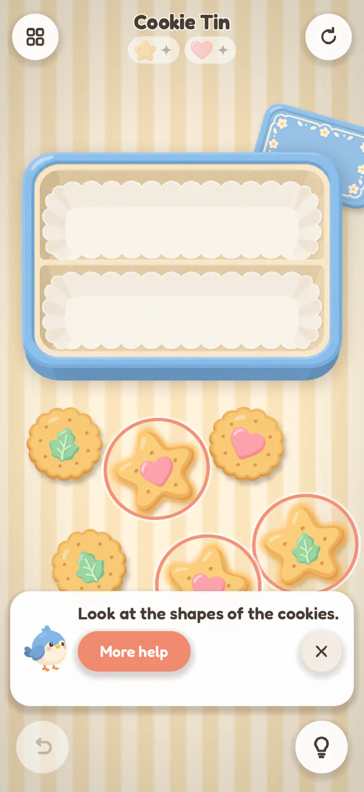 Cookie Tin with Pip's help open: “Look at the shapes of the cookies.”